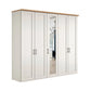 Wiemann Truro five Door hinged wardrobe with White Colour With one mirror door in the Middle and Oak Cornice