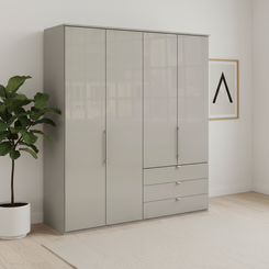 Wiemann Loft 4 Doors & 3 Drawers With Bi-Fold Doors Wardrobe in Glass Pebble Grey styled in a modern room
