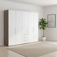 Wiemann Loft 5 Doors & 3 Drawers With Bi-Fold Doors Wardrobe in White with Dark Rustic Oak Carcase styled in a Bedroom
