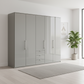 Wiemann Loft 5 Doors & 3 Drawers With Bi-Fold Doors Wardrobe in Glass Pebble Grey styled in a modern room