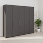 Wiemann Loft 5 Doors & 3 Drawers With Bi-Fold Doors Wardrobe in Havana styled in a modern room