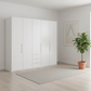 Wiemann Loft 5 Doors & 3 Drawers With Bi-Fold Doors Wardrobe in White styled in modern room