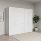 Wiemann Loft 5 Doors & 4 Drawers With Bi-Fold Doors Wardrobe in White styled in a modern room