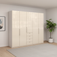 Wiemann Loft 5 Doors & 4 Drawers With Bi-Fold Doors Wardrobe in Glass Mangolia styled in a modern room