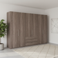 Wiemann Loft 6 Doors & 3 Drawers With Bi-Fold Doors Wardrobe in Dark Rustic Oak styled in a modern room