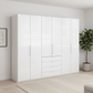Wiemann Loft 6 Doors & 5 Drawers With Bi-Fold Doors Wardrobe in Glass White styled in a modern room