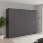 Wiemann Loft 6 Doors & 4 Drawers With Bi-Fold Doors Wardrobe in Havana styled in a modern room