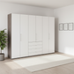 Wiemann Loft 6 Doors & 4 Drawers With Bi-Fold Doors Wardrobe in White with Dark Rustic Oak Carcase styled in a modern room