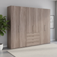 Wiemann Loft 6 Doors & 4 Drawers With Bi-Fold Doors Wardrobe in Dark Rustic Oak styled in a modern room