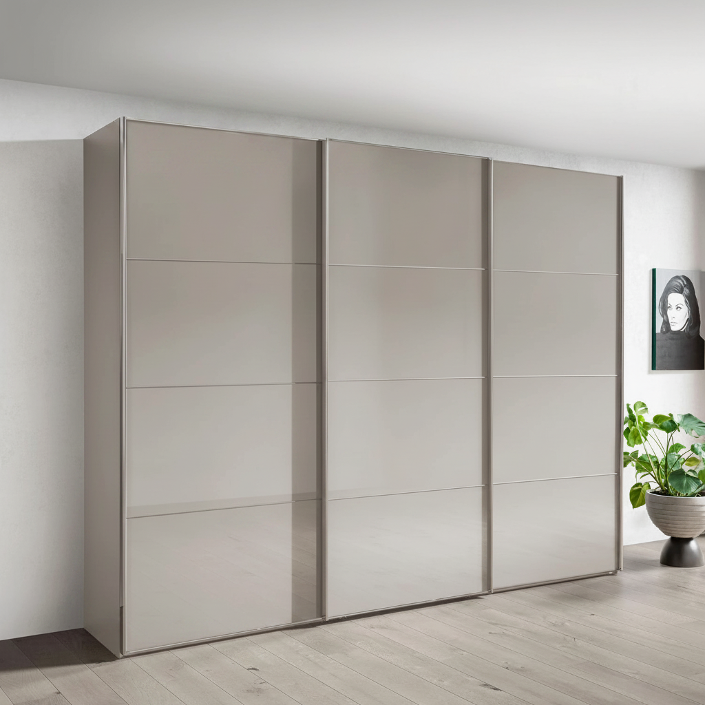 Wiemann Phoenix Pebble Grey 3 Door Sliding Wardrobe in Glass Styled in a Bedroom