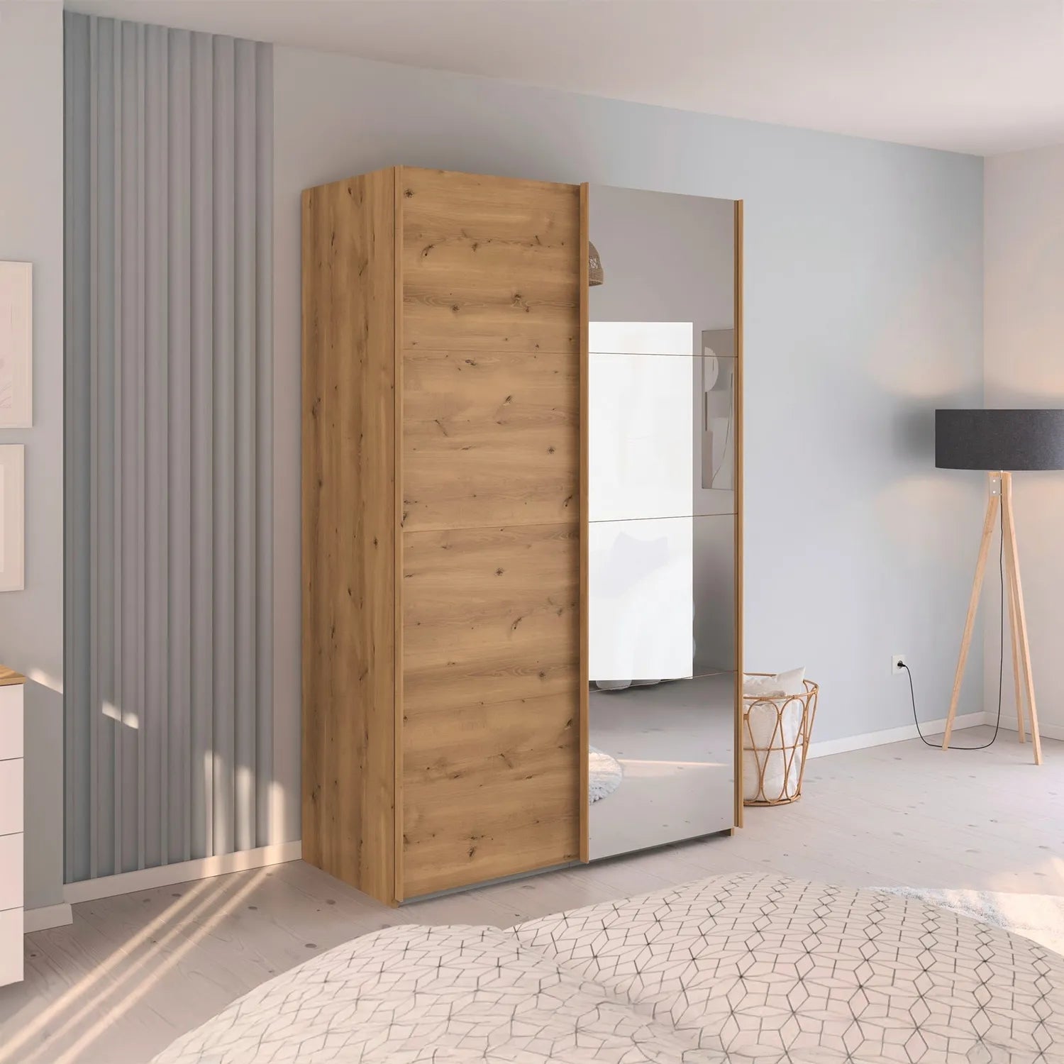 Rauch Wooden wardrobe with mirror in a modern room setting