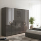 Amelia 300cm 6 Door Bifold Wardrobe with Glass Doors in Lava - Styled in a Bedroom