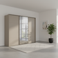 Rauch Heaven 270cm 3 Door Slider Wardrobe with 2 Décor Doors and 1 Mirror Door in Fango styled in a modern bedroom